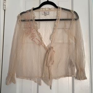 Sheer, light pink blouse